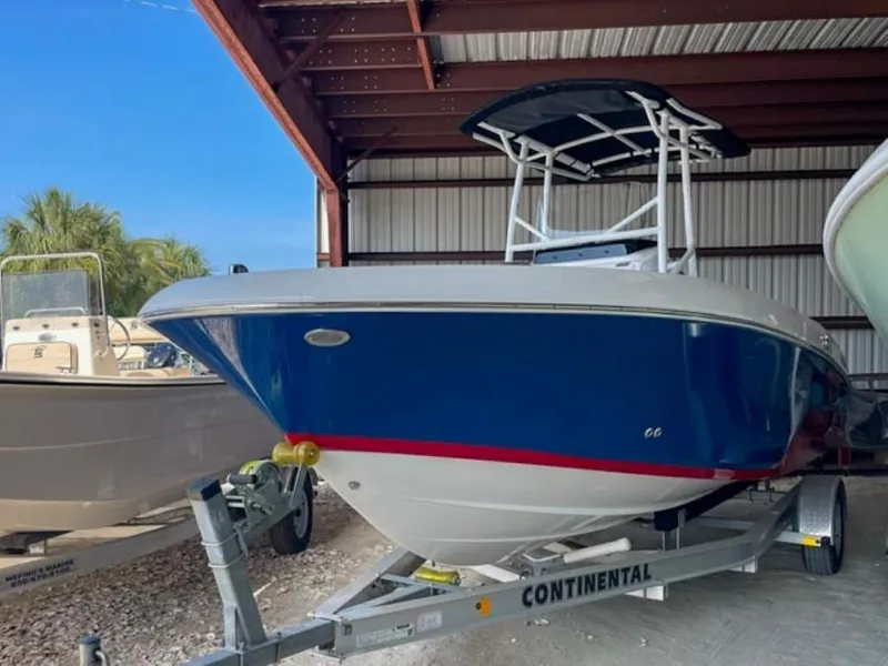 The Image of 2024 Wellcraft 202 Fisherman boat on Continental trailer in storage. - 0