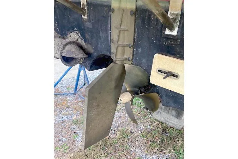 Slide: The Image of Propeller and rudder of 2016 Ranger Tugs R-31 boat, close-up view. - 13