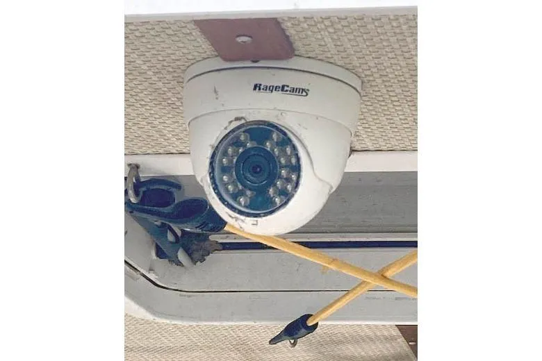 Slide: The Image of Security camera on 2016 Ranger Tugs R-31 boat ceiling. - 27