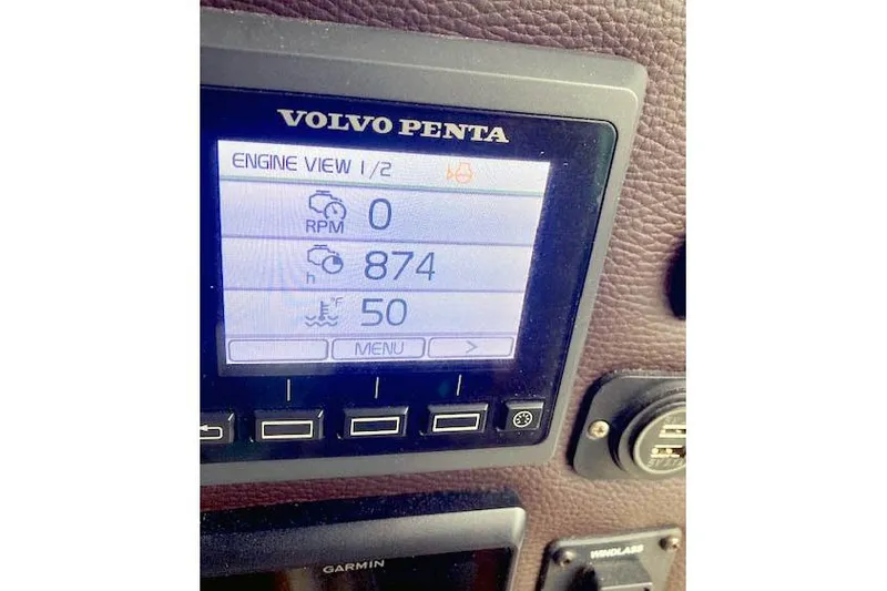 Slide: The Image of Volvo Penta engine display on 2016 Ranger Tugs R-31, showing RPM and engine hours. - 36