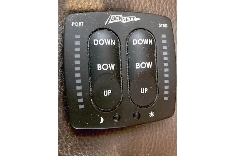 Slide: The Image of Bennett trim tab control panel on 2016 Ranger Tugs R-31 boat. - 40