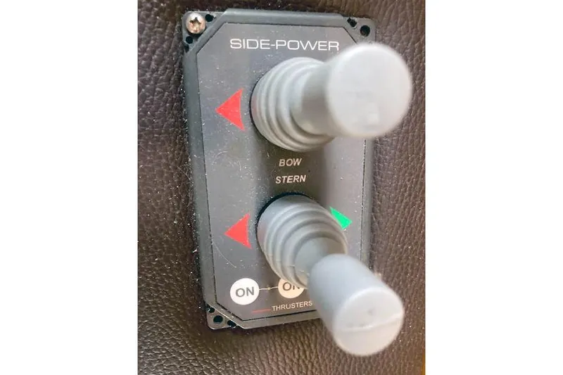 Slide: The Image of Control panel for bow and stern thrusters on 2016 Ranger Tugs R-31 boat. - 41