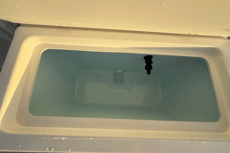 Slide: The Image of Livewell in 2024 Parker 1801 Center Console boat, filled with water. - 35