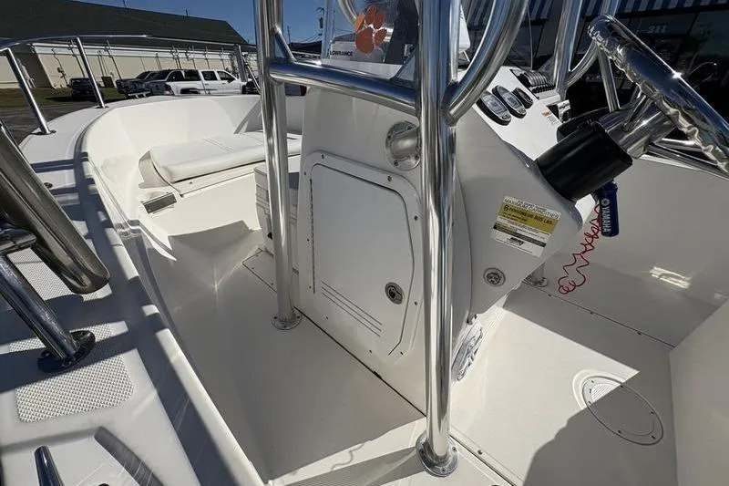 Slide: The Image of 2008 Edgewater 170CC boat interior with steering console and seating area. - 19