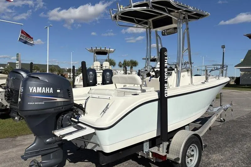 Slide: The Image of 2008 Edgewater 170CC boat with Yamaha engine on trailer, outdoor display. - 3