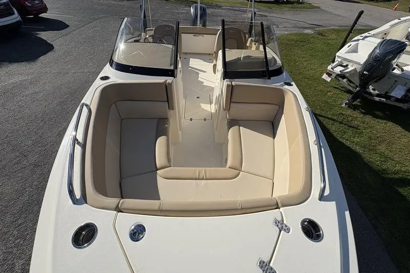 Slide: The Image of 2026 Scout 222 Dorado boat with spacious seating and sleek design. - 26