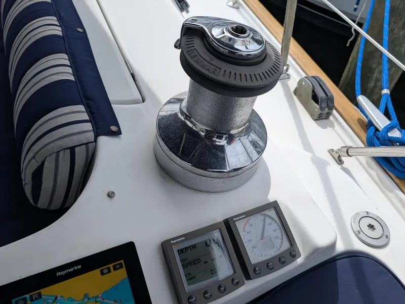 Slide: The Image of Control panel and winch on a 2003 Beneteau Oceanis 473 sailboat deck. - 48