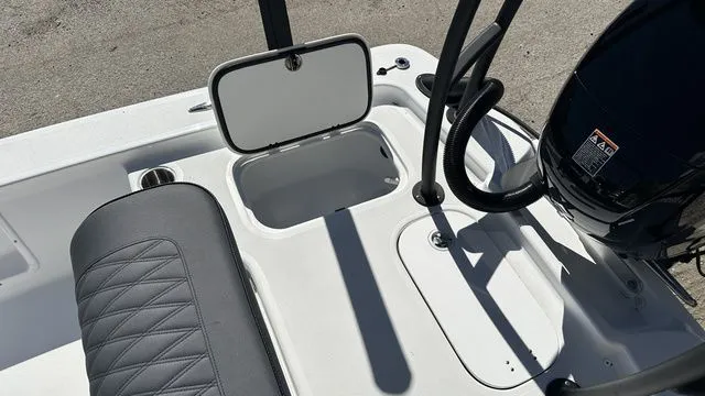 Slide: The Image of Interior of ALK2 Powerboats 17HS 2026 with storage and motor. - 41