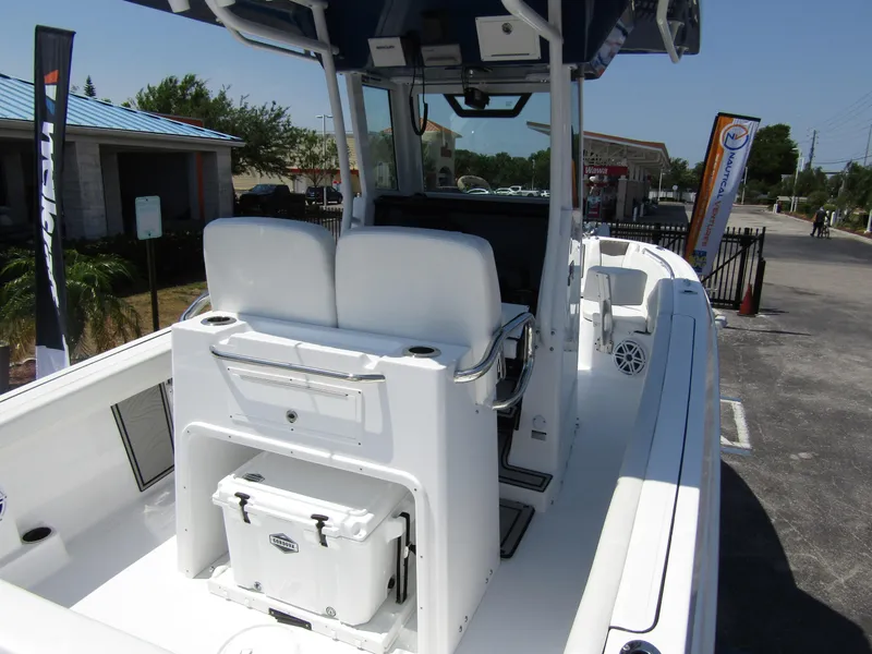 Slide: The Image of 2024 Wellcraft 243 Fisherman boat interior with seating and storage. - 38