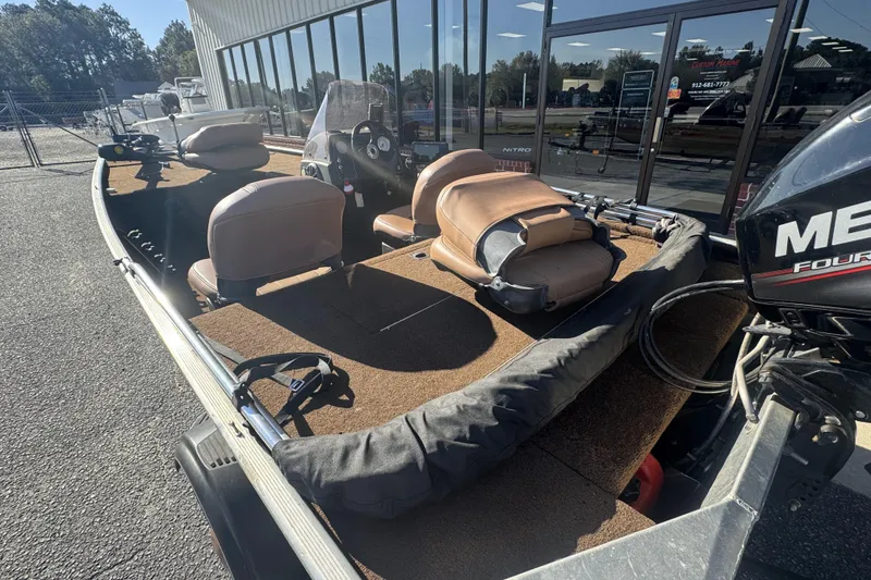 Slide: The Image of 2018 Tracker Bass Tracker 40th Anniversary Heritage Edition boat with seating and Mercury engine. - 14