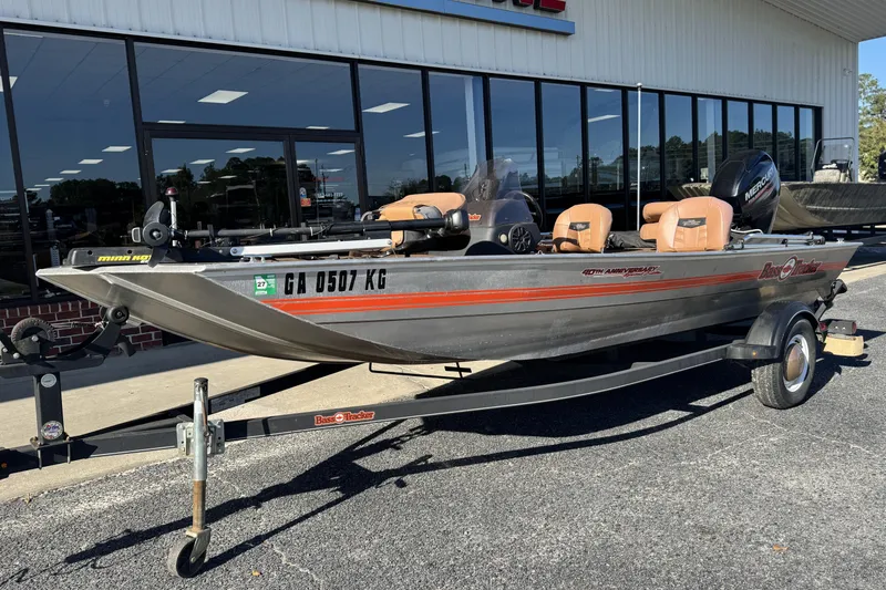 Slide: The Image of 2018 Tracker Bass Tracker 40th Anniversary Heritage Edition boat on trailer outside dealership. - 3