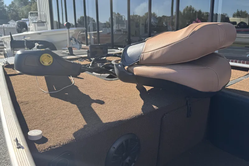 Slide: The Image of 2018 Tracker Bass Tracker 40th Anniversary Heritage Edition boat interior with seats and controls. - 6