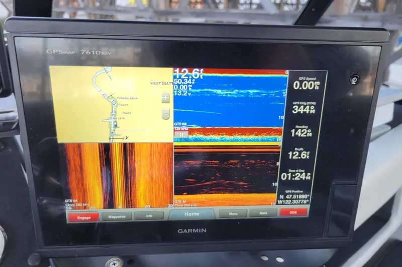 Slide: The Image of Garmin GPSMAP 7610xsv display on 1989 Bayliner 3888 Motoryacht, showing navigation and sonar data. - 18