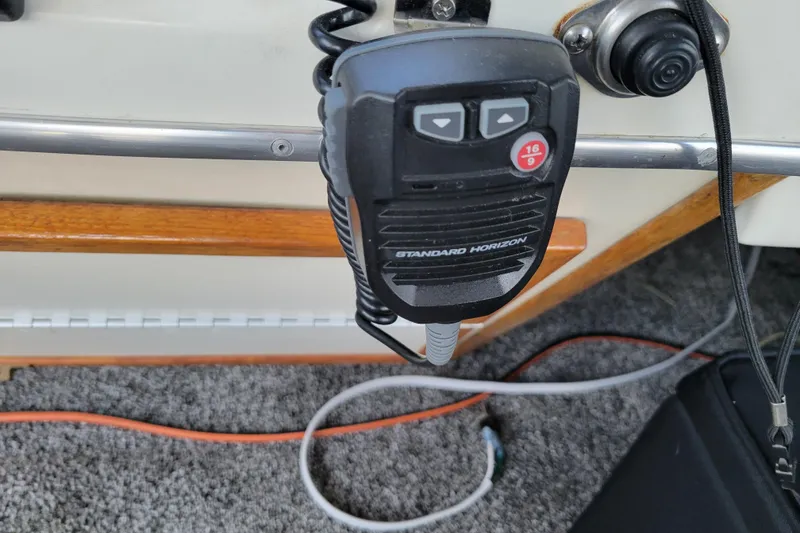 Slide: The Image of Marine radio microphone on 1989 Bayliner 3888 Motoryacht, featuring Standard Horizon branding. - 20
