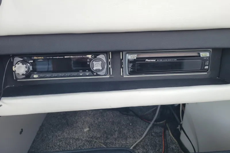 Slide: The Image of 1989 Bayliner 3888 Motoryacht dashboard with Pioneer stereo system. - 21