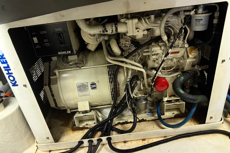 Slide: The Image of Engine compartment of a 1998 Riviera Convertible with Kohler generator. - 36