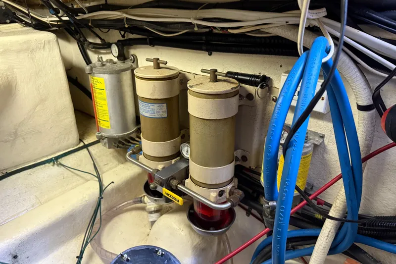 Slide: The Image of Engine room of 1998 Riviera Convertible with fuel filters and wiring. - 38