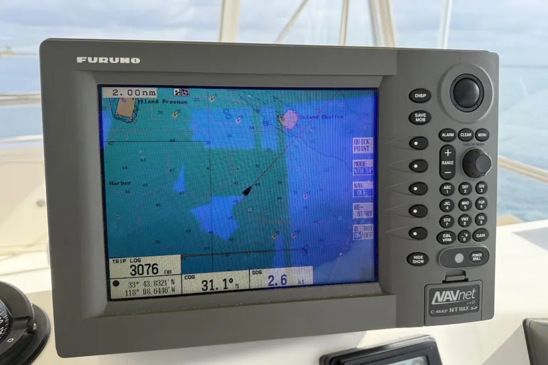 Slide: The Image of Furuno marine GPS system displaying nautical map on 1998 Riviera Convertible. - 44