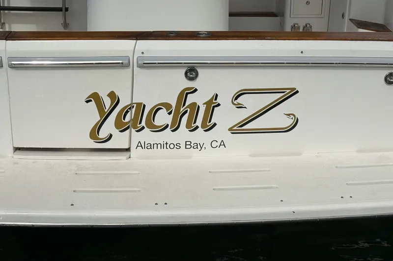 Slide: The Image of 1998 Riviera Convertible yacht named "Yacht Z" docked at Alamitos Bay, CA. - 50