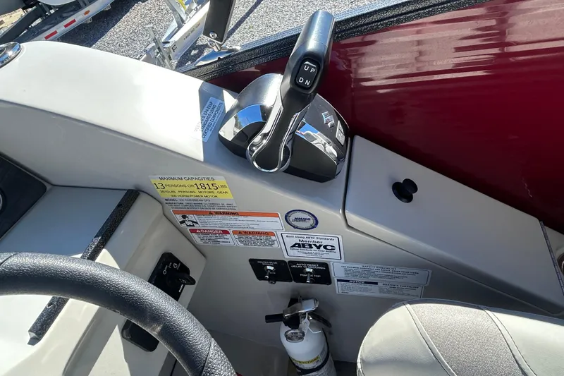 Slide: The Image of 2023 Crest Caribbean Platinum 230 boat interior with plush seating and cup holders. - 15