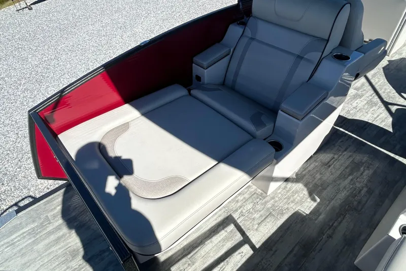 Slide: The Image of 2023 Crest Caribbean Platinum 230 boat with sleek motor and sturdy metal frame. - 18