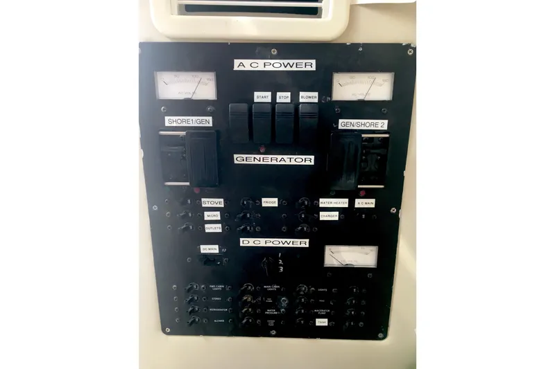 Slide: The Image of Electrical control panel on a 2002 Shamrock 290 Walkaround boat. - 19