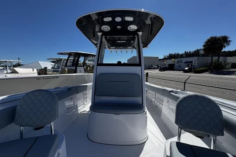 Slide: The Image of 2026 Sportsman Open 232 Center Console boat with modern seating and sleek design. - 10