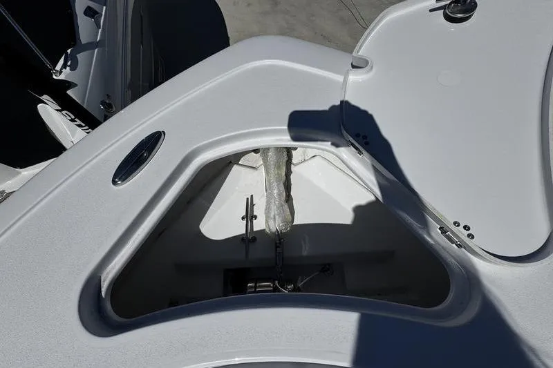 Slide: The Image of 2026 Sportsman Open 232 Center Console anchor storage compartment. - 9