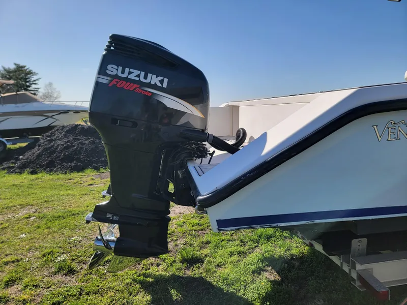 Slide: The Image of 1996 Venture 34 Center Console boat with Suzuki Four Stroke outboard motor. - 7