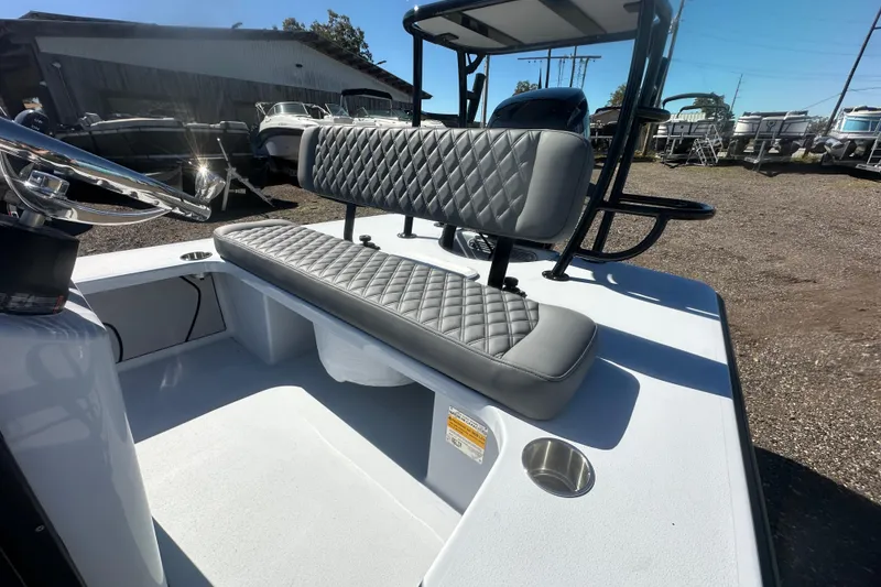 Slide: The Image of 2026 Delta Boatworks Delta D18 interior with quilted seating and steering wheel. - 14