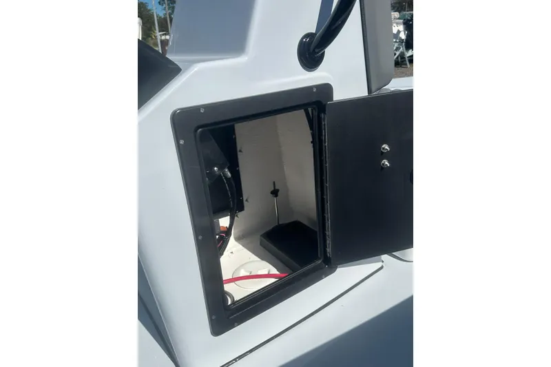 Slide: The Image of Open compartment on 2026 Delta Boatworks Delta D18, showcasing interior wiring and components. - 20