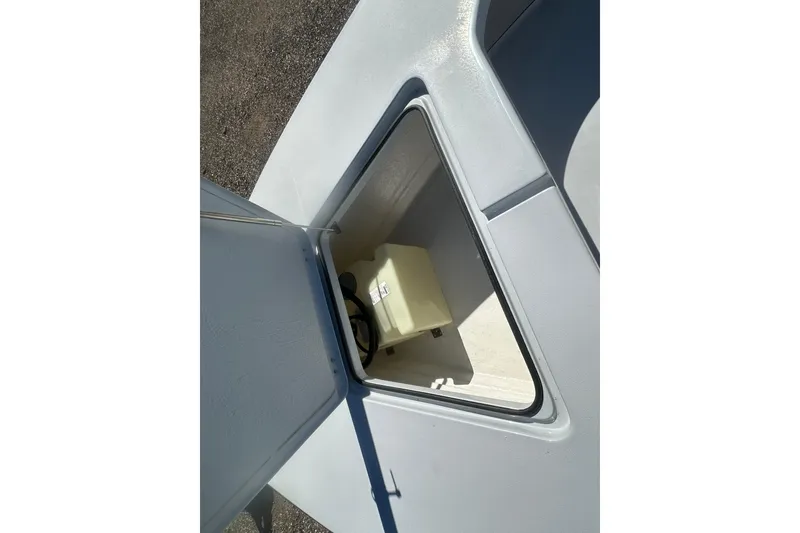 Slide: The Image of Open storage compartment on 2026 Delta Boatworks Delta D18 boat deck. - 25