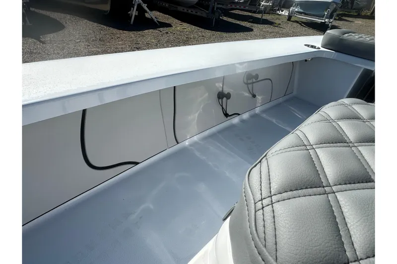 Slide: The Image of 2026 Delta Boatworks Delta D18 interior with quilted seating and clean design. - 26