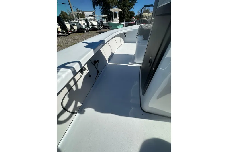 Slide: The Image of 2026 Delta Boatworks Delta D18 interior view, showcasing spacious deck and seating area. - 29
