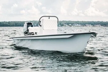 Slide: The Image of 2026 Delta Boatworks Delta D18 with Suzuki 75 outboard motor, parked outdoors. - 3