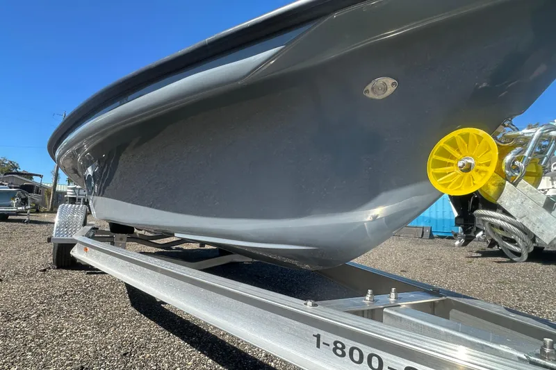 Slide: The Image of 2026 Delta Boatworks Delta D18 on trailer, showcasing sleek hull design. - 31