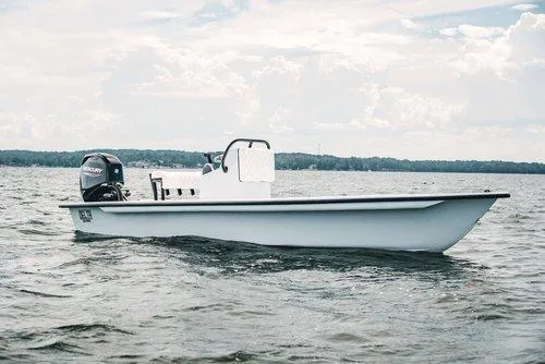 Slide: The Image of 2026 Delta Boatworks Delta D18 with Suzuki outboard motor on trailer. - 4