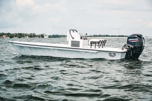 Slide: The Image of 2026 Delta Boatworks Delta D18 on trailer, parked outdoors under clear sky. - 5