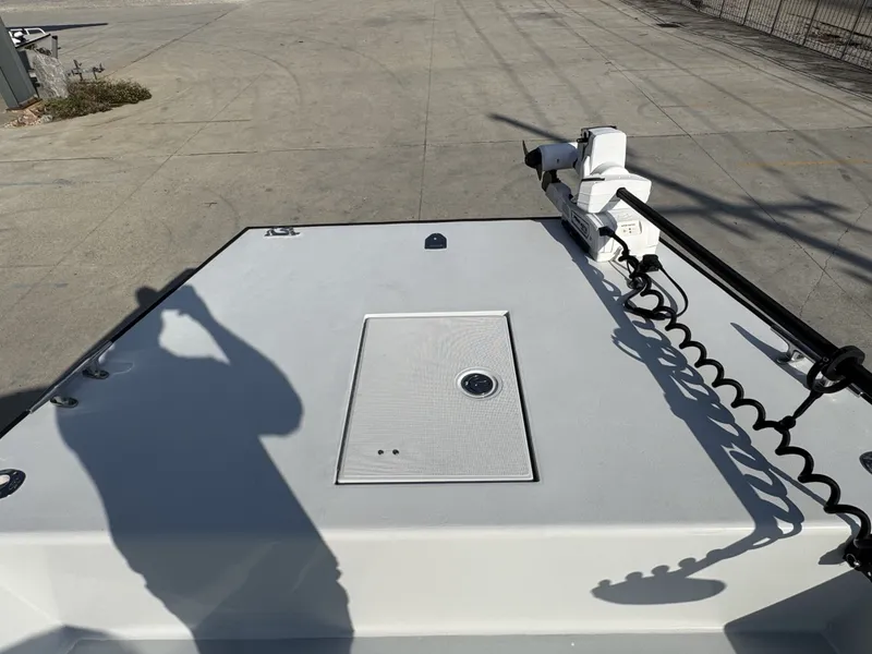 Slide: The Image of Bow of a 2005 FinCat 35 boat with mounted equipment and shadow. - 26