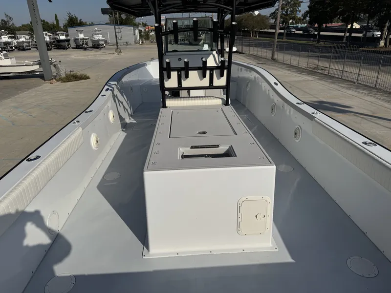 Slide: The Image of Open deck of a 2005 FinCat 35 boat, featuring spacious seating and storage. - 6
