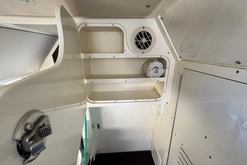 Slide: The Image of 2019 Scout 355 LXF interior storage shelves with ventilation. - 28