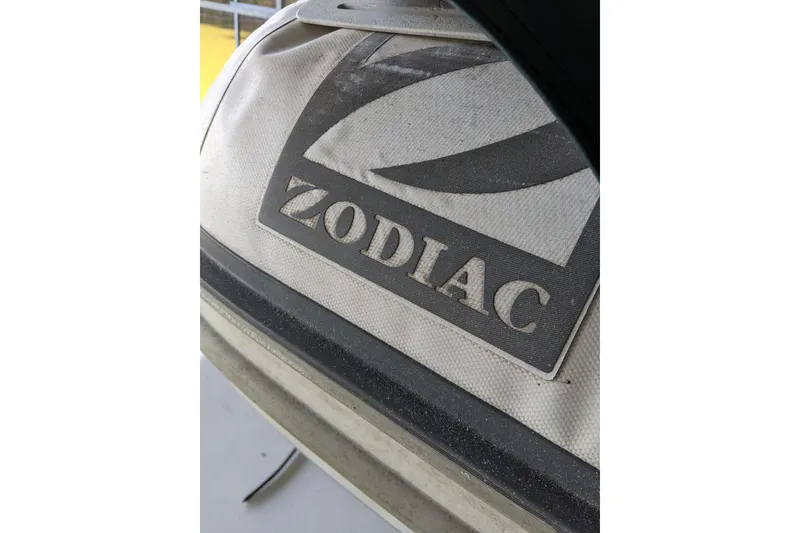 Slide: The Image of Zodiac logo on a 1984 Gulfstar 49 Motor Yacht, close-up view. - 109