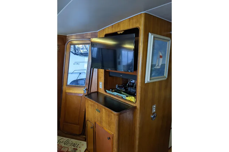 Slide: The Image of Interior of 1984 Gulfstar 49 Motor Yacht with TV and nautical decor. - 20