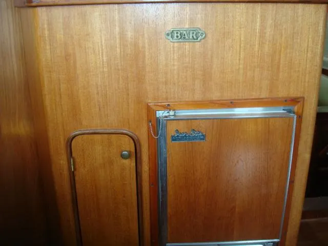 Slide: The Image of Wooden bar area on a 1984 Gulfstar 49 Motor Yacht. - 22