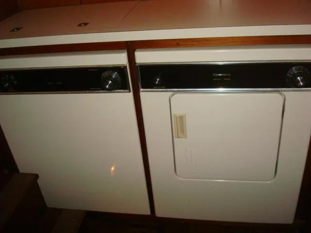 Slide: The Image of Laundry appliances inside a 1984 Gulfstar 49 Motor Yacht. - 28
