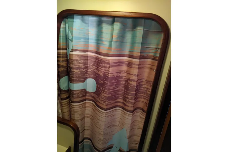 Slide: The Image of Shower area with colorful curtain on 1984 Gulfstar 49 Motor Yacht. - 61