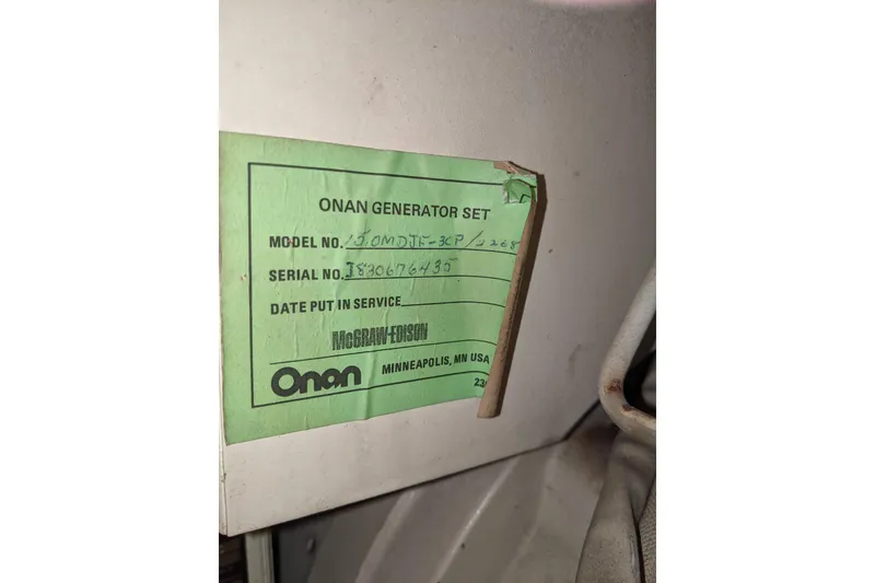 Slide: The Image of Onan generator label on 1984 Gulfstar 49 Motor Yacht, model 12.0MDJE-3CR/2268. - 80
