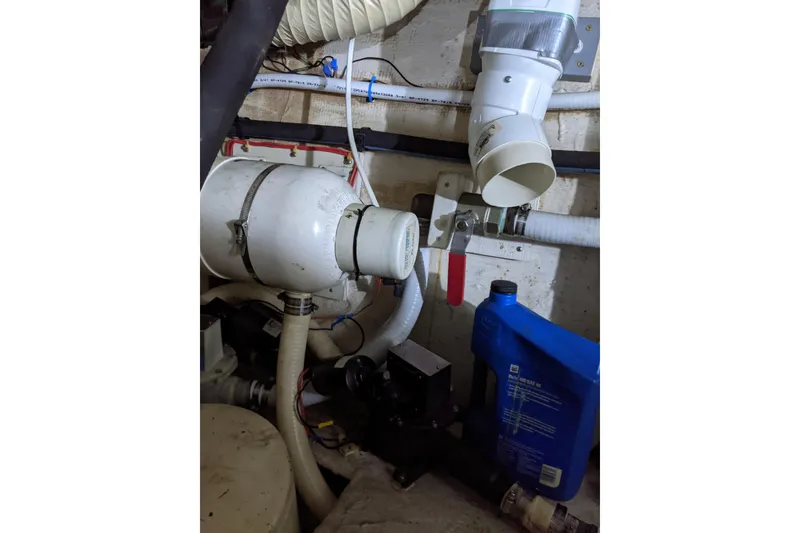Slide: The Image of Engine room of 1984 Gulfstar 49 Motor Yacht with ventilation and piping system. - 82