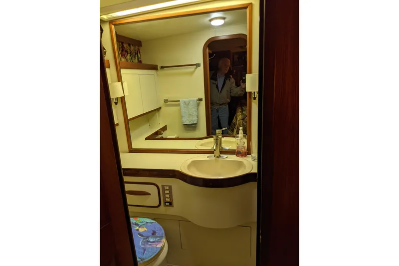 Slide: The Image of Bathroom interior of 1984 Gulfstar 49 Motor Yacht with sink and mirror. - 91