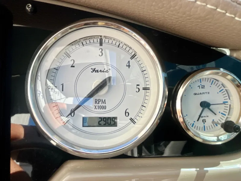 Slide: The Image of Close-up of 2017 Regal 28 Express tachometer and clock, showing 2900 RPM. - 11